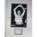 HENRY COOPER A signed Black & White mounted by unframed photo of boxer Henry Cooper in the 1960's.