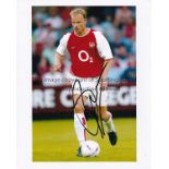 DENNIS BERGKAMP SIGNED PHOTO'S Three signed colour photographs of Arsenal legend Dennis Bergkamp.