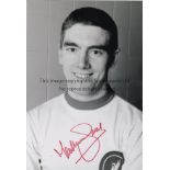 LIVERPOOL Autographed b/w 12 x 8 photo, showing Liverpool reserve Ted MacDougall posing for