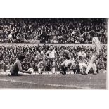 MAN UNITED Four Black & White Press Photos of Manchester United in action in the 1970's plus a Red