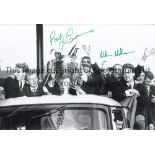 CELTIC B/W 12 x 8 photo, showing Celtic players aboard an open top bus as they parade the European