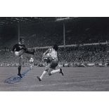 HUGH CURRAN Three 12 x 8 photos showing Curran scoring for Scotland at Wembley c1971, posing for