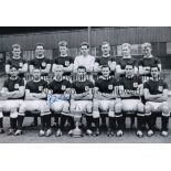 DUNDEE 1962 B/W 12 x 8 photo showing players posing with the First Division trophy during a photo-