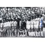 MARTIN PETERS B/W 12 x 8 photo, showing England players lining up shoulder to shoulder prior to a