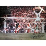 NORMAN HUNTER / LEEDS UNITED AUTOGRAPH A 15" X 12" signed colour photograph of Norman Hunter