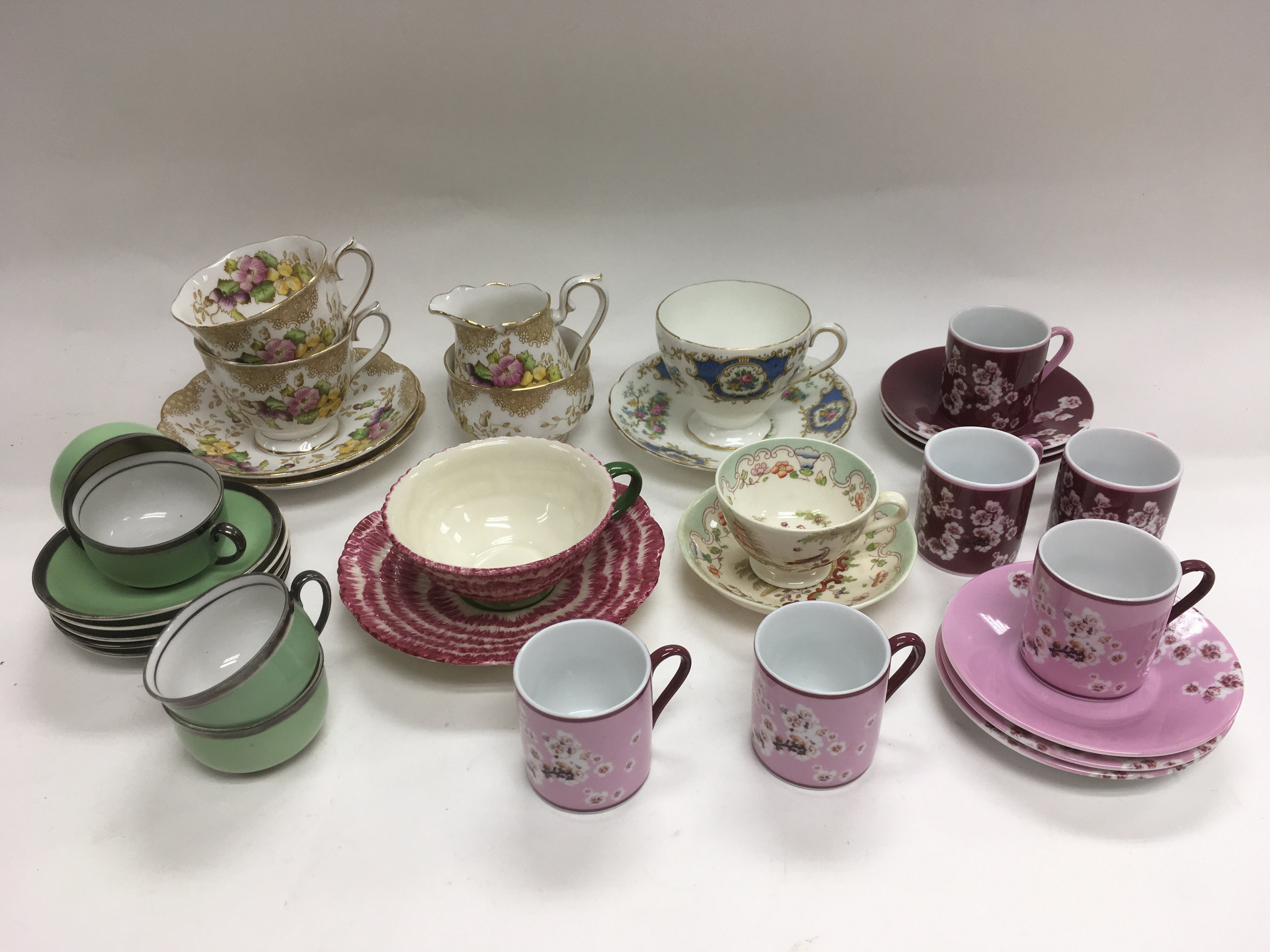 A Royal Albert part tea service in 'Lovelace' pattern plus other cups and saucers.