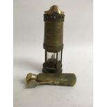 A unusual lighter in the form of a miners lamp and