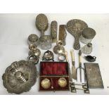 A silver backed brush set, cased set of salts,tidy