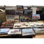 14 plastic model kits of cars including Bandai, Re