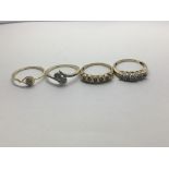 Four 9ct gold rings set with clusters of small dia