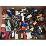A large collection of loose diecast vehicles inclu