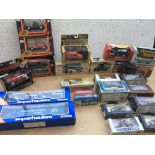 A collection of boxed diecast vehicles including c