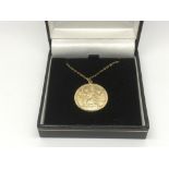 A 9ct gold St Christopher pendant on chain, approx 4.18g.