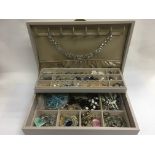 A jewellery box containing various jewellery items.