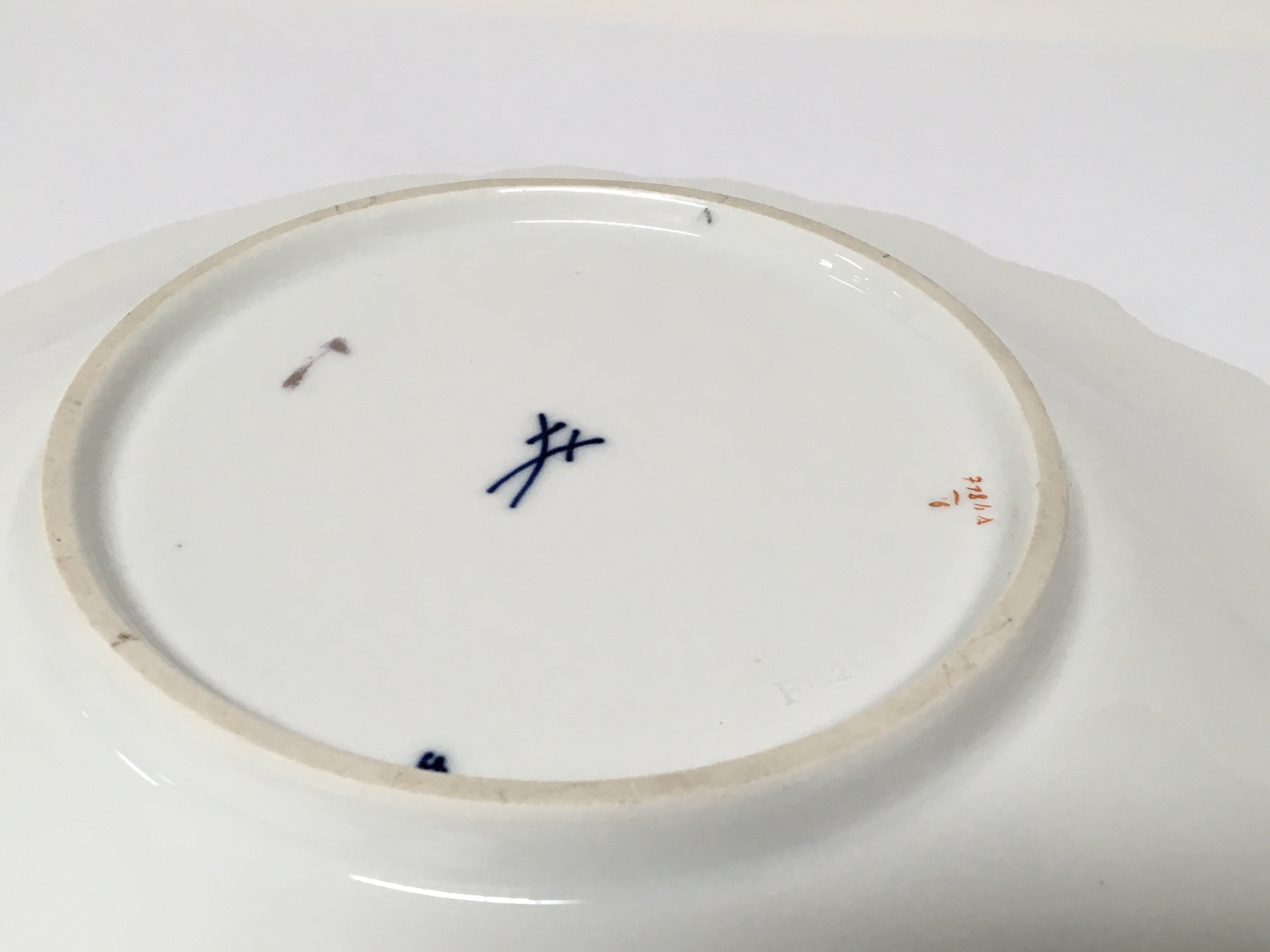 A Meissen porcelain plate with hand painted porcel - Image 2 of 2