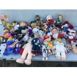 A box of soft toys including dolls etc