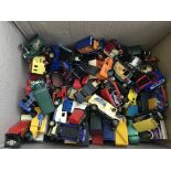 A collection of loose diecast vehicles including c