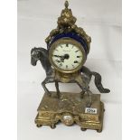 A French gilt metal clock case the clock mounted o