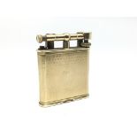 A vintage 9ct gold Dunhill lighter.