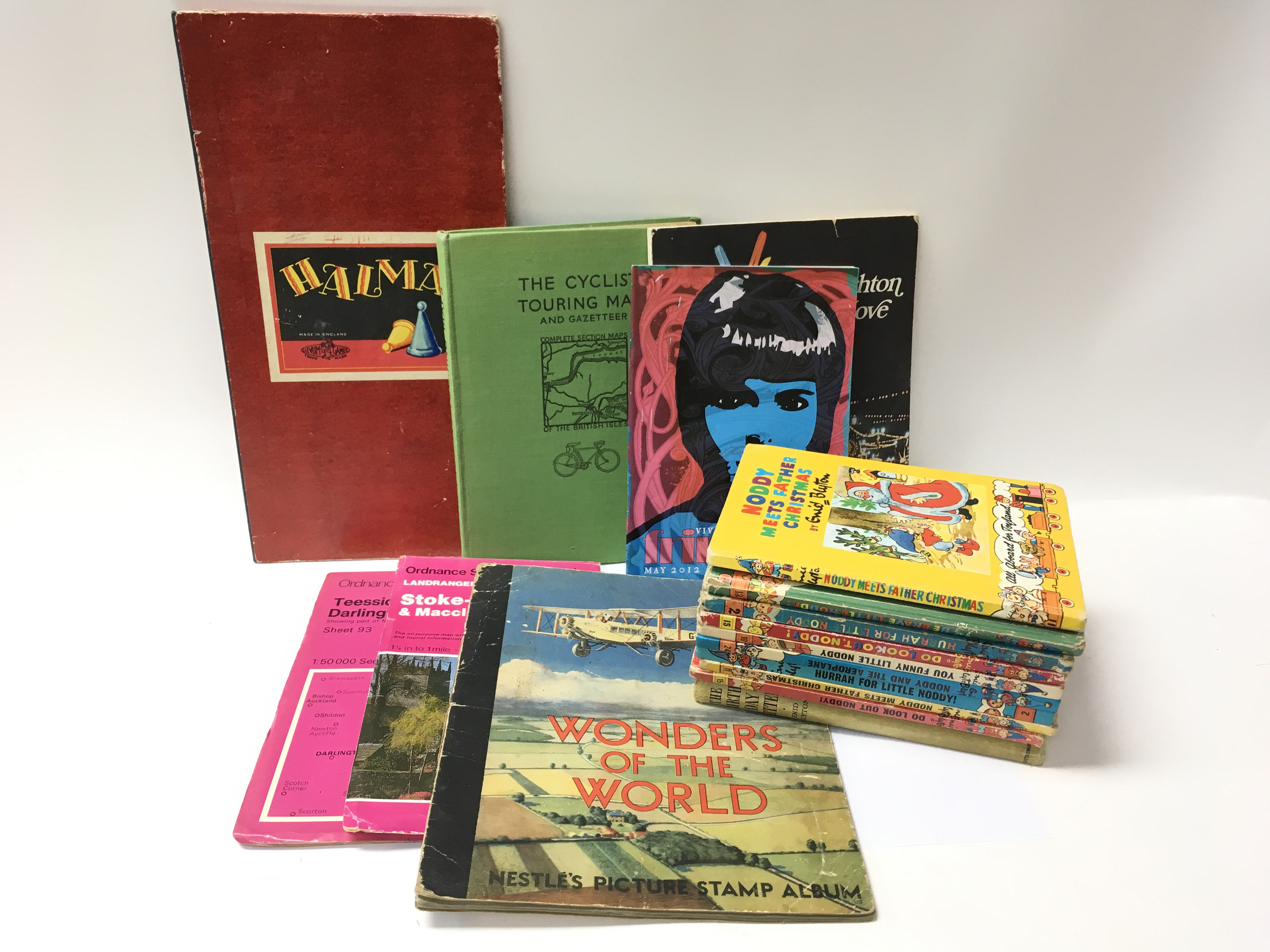 A collection of vintage Noddy books, ordnance survey maps, nestle picture stamp album, cigarette