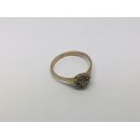 A 9ct gold diamond cluster ring, approx 1.28g and