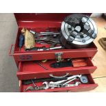 A red two draw tool box contains britool ratchet a