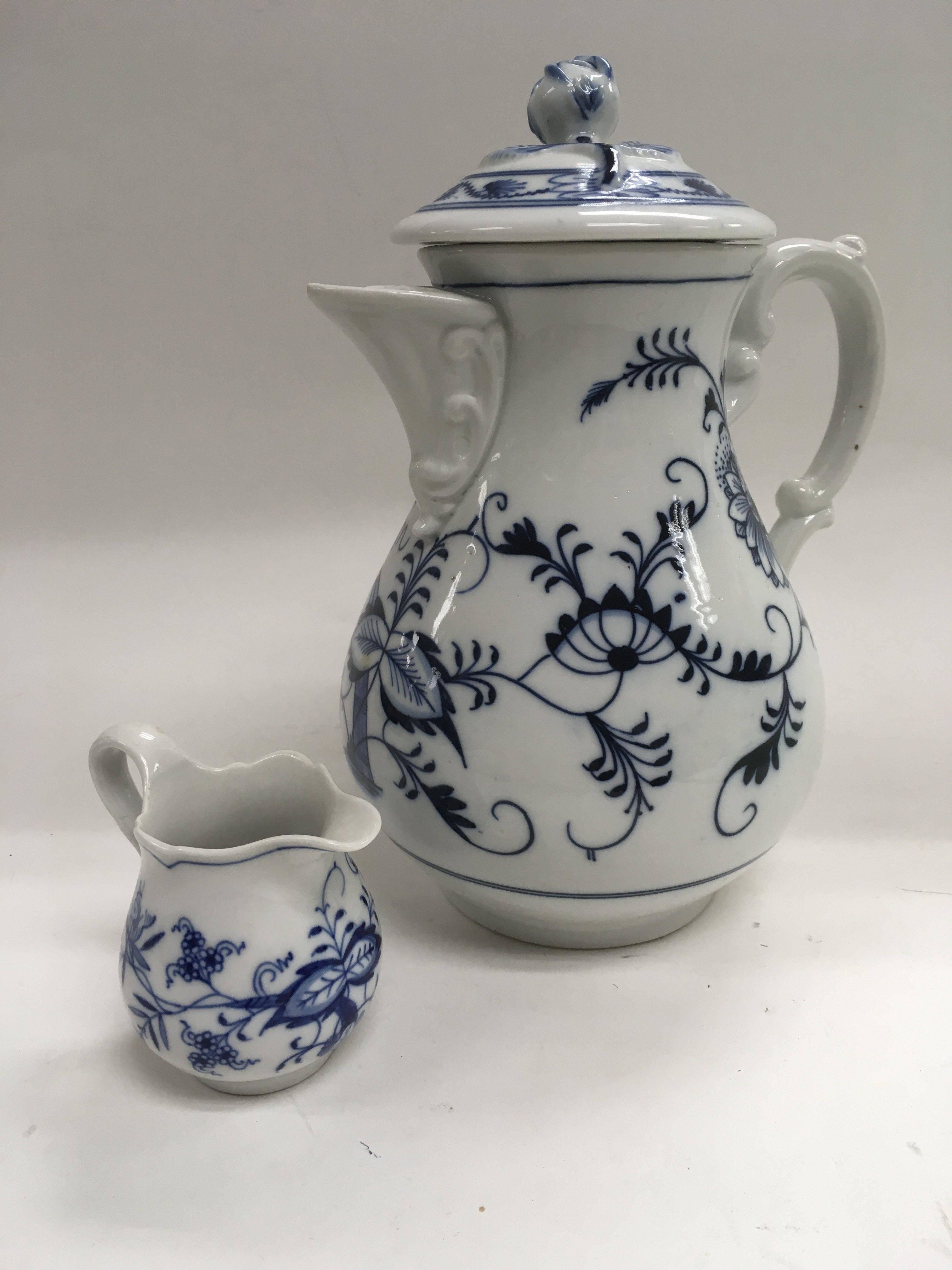 A blue and white Meissen coffee pot and matching j