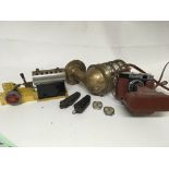 A collection of items comprising a brass cased shi