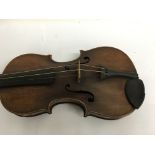 A wooden cased violin with applied label 37 cm but