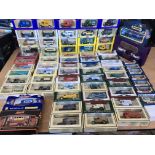 A collection of boxed diecast vehicles including M