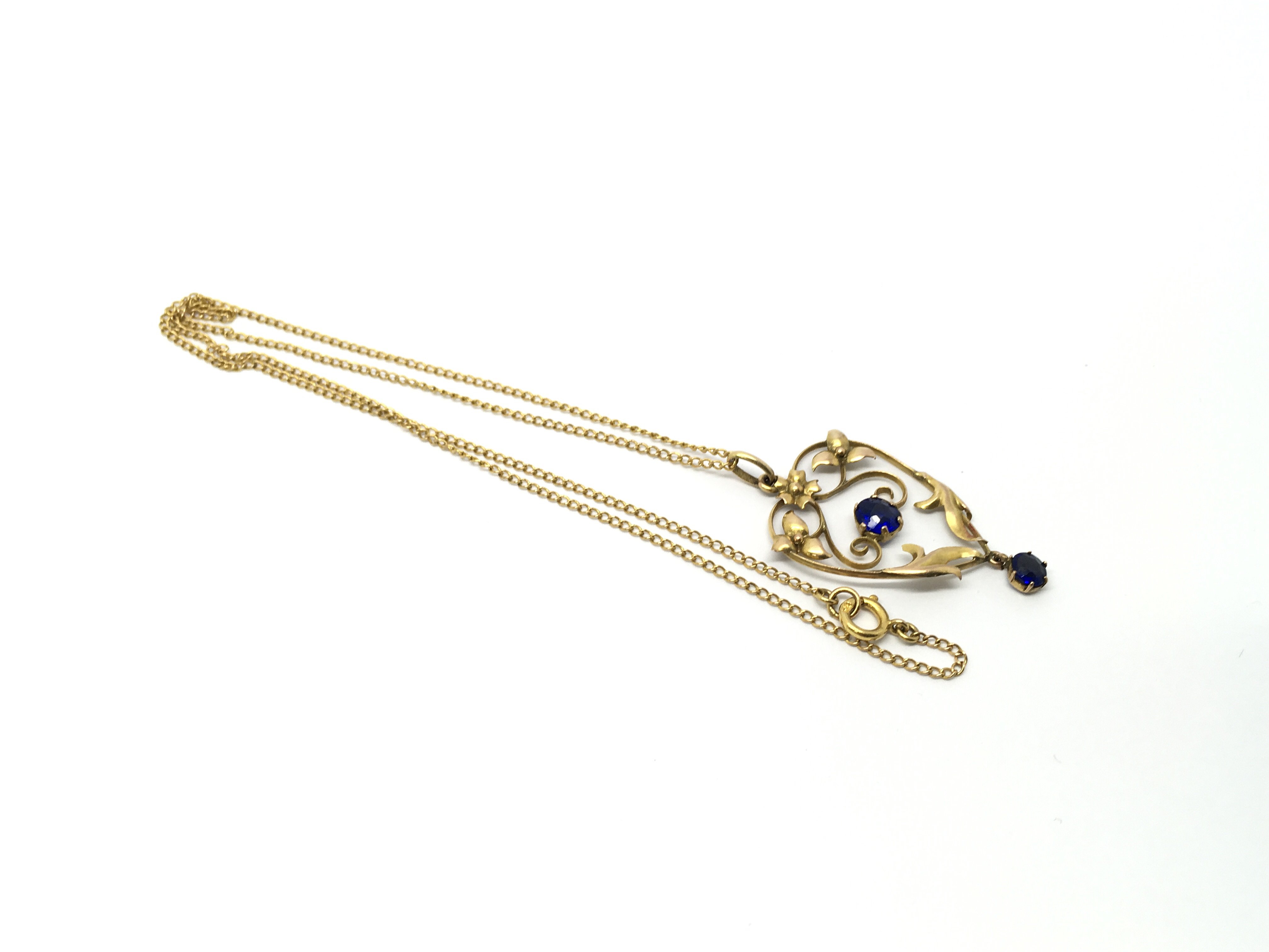 An Edwardian gold and sapphire pendant of naturali - Image 2 of 2