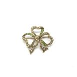 A 15ct gold pearl and emerald brooch in the form o