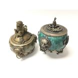Two small Chinese lidded pots, both decorated with
