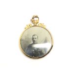 A 9ct gold Victorian/Edwardian locket containing c