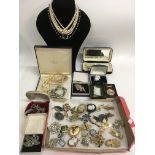 A collection of costume jewellery including brooch