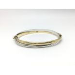 A 9ct gold two tone bangle, total weight approx 7.