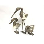 Three decorative plates birds with shell bodies, t
