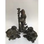 Three Chinese figural root carvings, including a p
