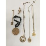 A small collection of gold and gold tone jewellery