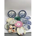 A collection of Edwardian decorative plates and te