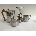 A three piece tea set and a Art Deco style lamp ba