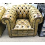 A vintage Chesterfield leather sofa with matching