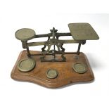 A set of postal scales for letters with three weig