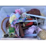 A box of dolls clothes and doll stands etc