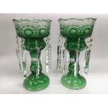 A pair of green glass lustres, approx height 32.5c