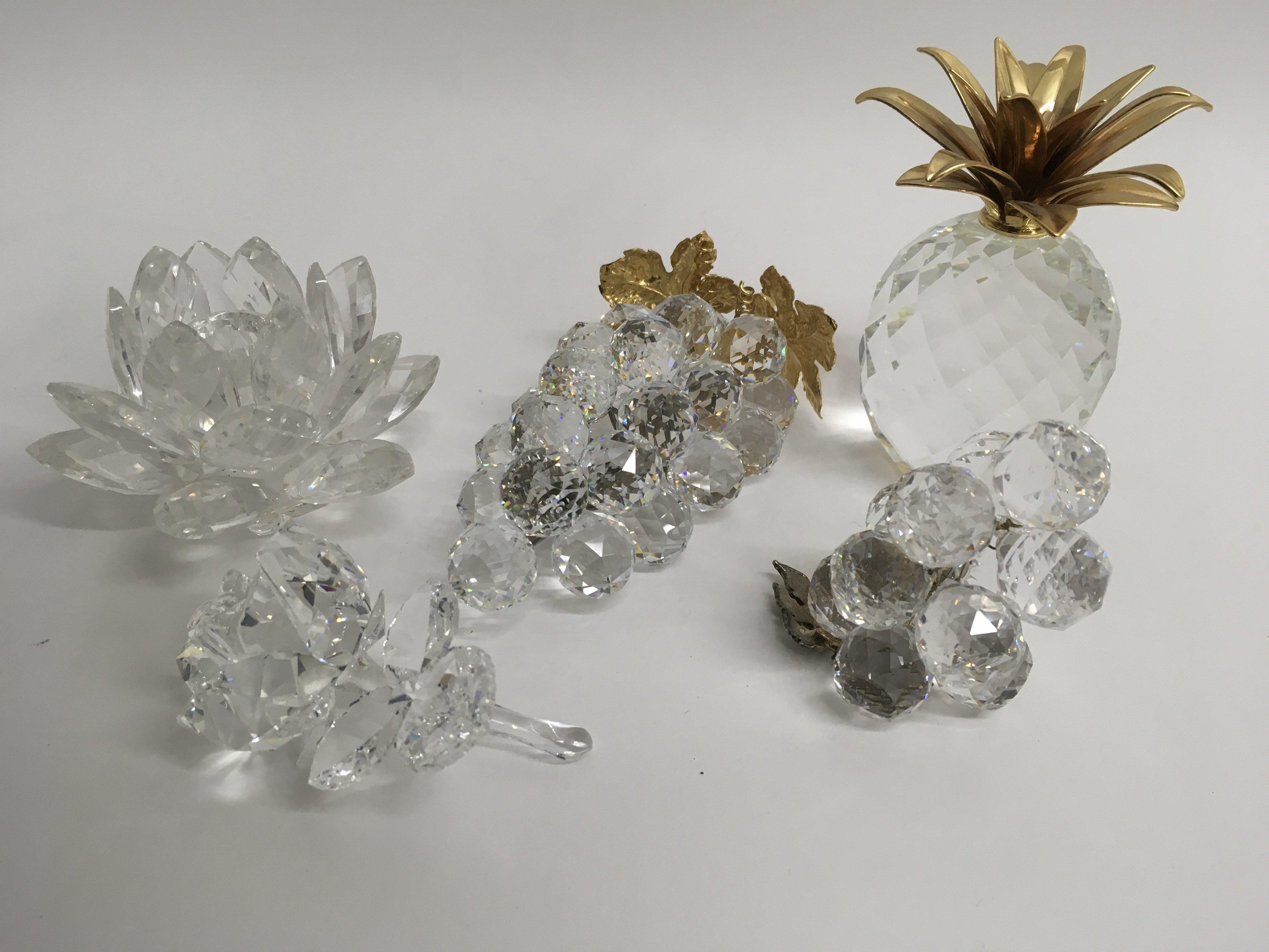 Five Swarovski crystal ornaments comprising a pine