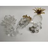 Five Swarovski crystal ornaments comprising a pine