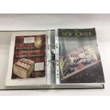 A binder containing various New Yorker magazine fr