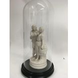 A Victorian bisque figure in the form of a couple