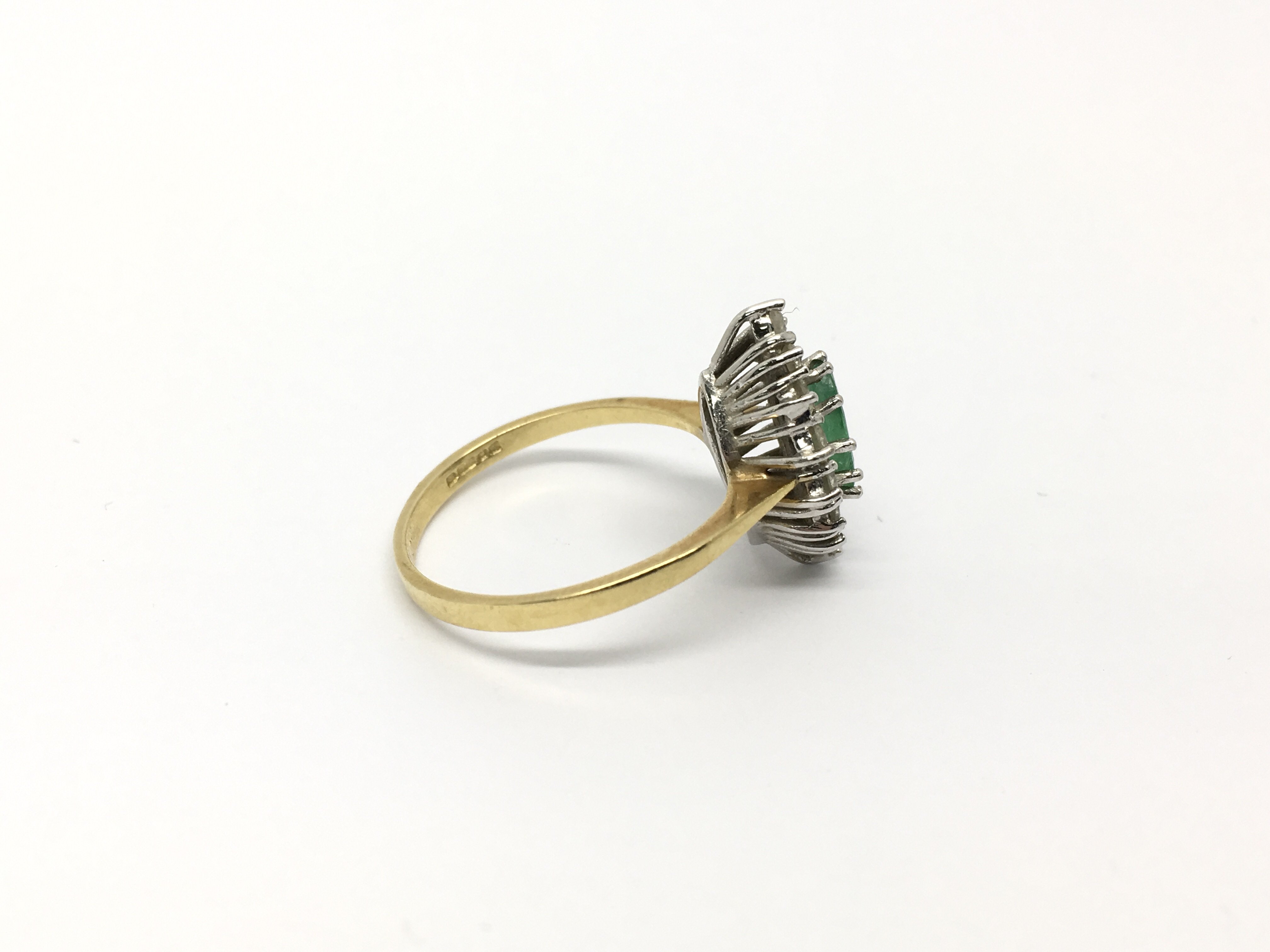 A ladies 9ct gold ring set with a central marquise - Image 2 of 2